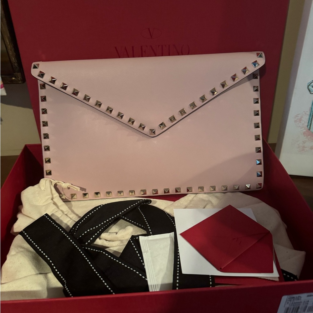 New with tags. Valentino clutch. Pale pink. Authentic.